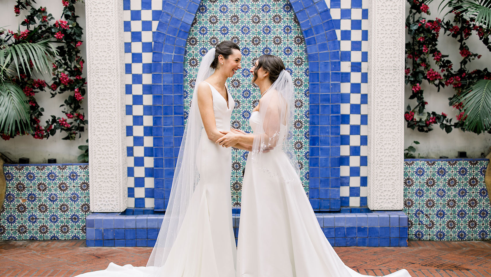 Brides in front of hotel